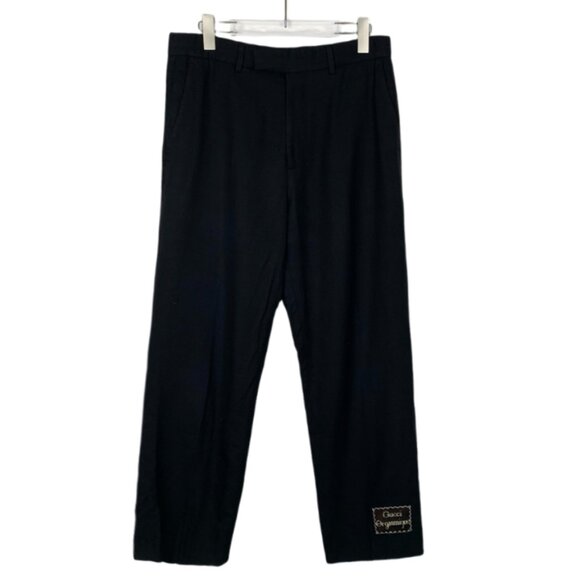 016490 Gucci logo patch black cotton and linen blend straight-leg trousers Size